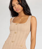 Stay on-trend this season with the Sweetest Poise Button Bodycon Midi Dress in taupe, a must-have for creating stylish and effortless spring outfits for women.
