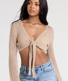 From bold to effortless, the Under The Sun Long Sleeve Tie-Front Crop Top lets you define your vibe with taupe tops that speak your style.