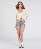 Stay on-trend this season with the Springtime Cutie Button Front Knit Cardigan in beige, a must-have for creating stylish and effortless summer outfits for women.