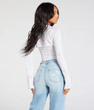 From bold to effortless, the Easy Charm Floral Crop Tube Top lets you define your vibe with ivory tops that speak your style.