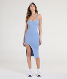 With its mid-calf hem and popular flattering fit, the Take Me There V-Neck Slit Bodycon Midi Dress in light blue nails the balance of trend and ease, redefining go-to midi dresses for any occasion.