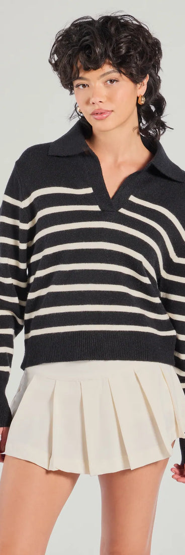 The Stylish Stripes Collared Knit Sweater in black with a modern design and trendy look is part of the latest women's tops collection to elevate your 2025 wardrobe.