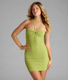 Soak up the season in the Carefree Energy Halter Bodycon Mini Dress, a chartreuse sundress styled for easy days, outdoor plans, and everything in between.