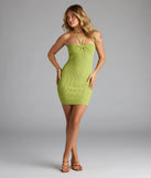 Soak up the season in the Carefree Energy Halter Bodycon Mini Dress, a chartreuse sundress styled for easy days, outdoor plans, and everything in between.
