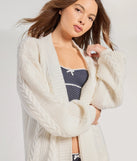 
Upgrade your style game for 2025 with the Layer On The Cute Cable Knit Duster Sweater in ivory, perfect for any fashion-forward wardrobe.