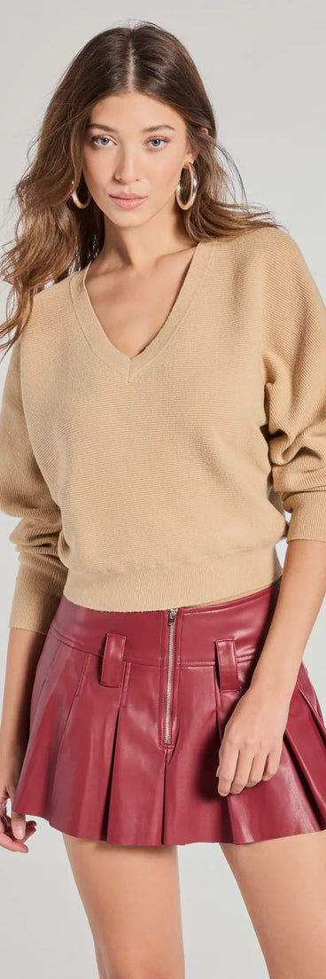 The Classic Fave Ribbed Knit V-Neck Sweater in taupe with a modern design and trendy look is part of the latest women's tops collection to elevate your 2025 wardrobe.