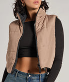 Stay chic this winter with Casual Sleek Reversible Cropped Puffer Vest, a black women's coat perfect for layering. Featuring textured fabric and a trendy fit, this lightweight coat for women transitions effortlessly from cozy everyday wear to formal evening events.
