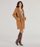 The Perfect Chic Faux Wool Trench Coat in camel is a women's workwear piece offering a trendy style and unique accents, perfect for effortlessly creating an outfit-of-the-day look that transitions your office look to going-out ready.