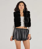 Stay chic this winter with Perfectly Luxe Faux Fur Cropped Vest, a heather gray women's coat perfect for layering. Featuring textured fabric and a trendy fit, this lightweight coat for women transitions effortlessly from cozy everyday wear to formal evening events.