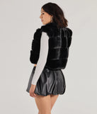 Stay chic this winter with Perfectly Luxe Faux Fur Cropped Vest, a heather gray women's coat perfect for layering. Featuring textured fabric and a trendy fit, this lightweight coat for women transitions effortlessly from cozy everyday wear to formal evening events.