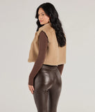 Stay chic this winter with Cozy Glamour Faux Fur Cropped Vest, a heather gray women's coat perfect for layering. Featuring textured fabric and a trendy fit, this lightweight coat for women transitions effortlessly from cozy everyday wear to formal evening events.