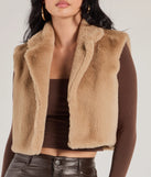 Stay chic this winter with Cozy Glamour Faux Fur Cropped Vest, a heather gray women's coat perfect for layering. Featuring textured fabric and a trendy fit, this lightweight coat for women transitions effortlessly from cozy everyday wear to formal evening events.