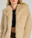 Celebrate in style with this stunning taupe New Year's Eve outfit essential, the Glam Aura Faux Fur Jacket, featuring the latest statement-making details and a glamorous design perfect for holiday events.
