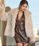 Celebrate in style with this stunning taupe going-out outfit essential, the Glam Aura Faux Fur Jacket, featuring the latest statement-making details and a glamorous design perfect for any festive 2025 event.