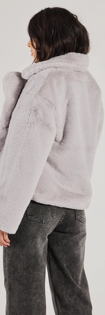 Stay chic this winter with Diva Chic Cropped Faux Fur Jacket, a gray women's coat perfect for layering. Featuring textured fabric and a trendy fit, this lightweight coat for women transitions effortlessly from cozy everyday wear to formal evening events.