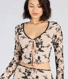From bold to effortless, the Flirt Alert Flocked Floral Mesh Tie-Front Top lets you define your vibe with ivory tops that speak your style.