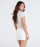 From bold to effortless, the Breezy Vibes Lace Tie-Front Top lets you define your vibe with ivory tops that speak your style.