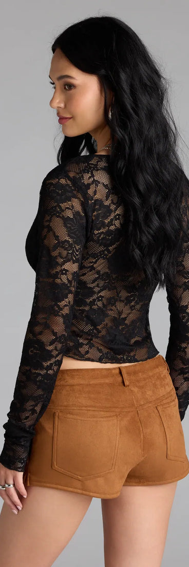 Add a sleek touch to your outfit with this black long sleeve top—the Delicate Flair Floral Lace Tie-Front Top makes effortless transitions from desk to dinner.