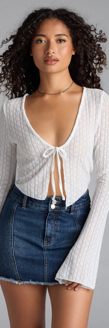 From bold to effortless, the Breezy Beauty Floral Lace Tie-Front Top lets you define your vibe with white tops that speak your style.