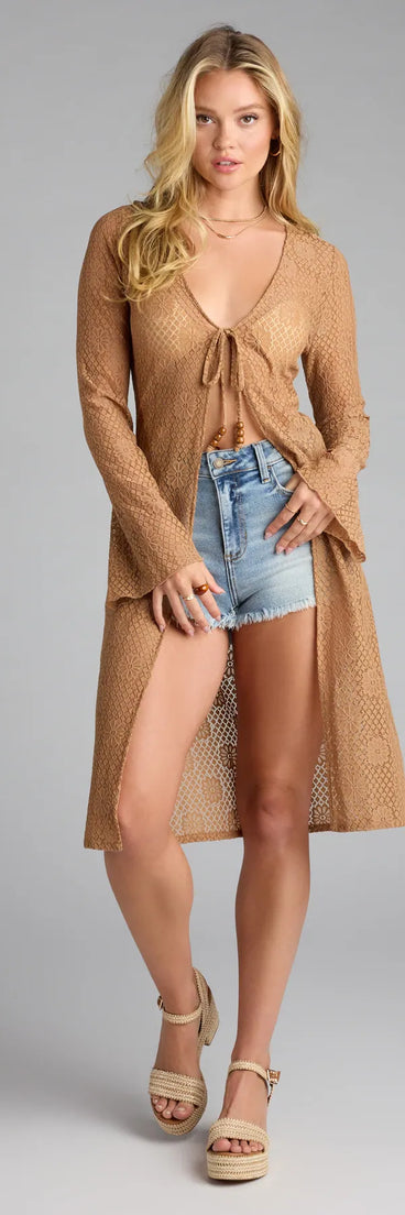 Refresh your wardrobe with the Beach Siren Energy Crochet Lace Duster, a tan fashion jacket that adds statement style to every look.