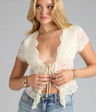 For college campus looks, game day outfits, or a bold going-out vibe, the Sweet Lovin' Lace Tie Front Crop Top is an on-trend ivory crop top that easily styles with your favorite denim.