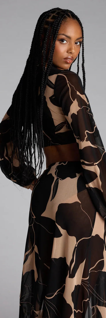 Add a sleek touch to your outfit with this black long sleeve top—the Resort Calling Mesh Tie Front Top makes effortless transitions from desk to dinner.