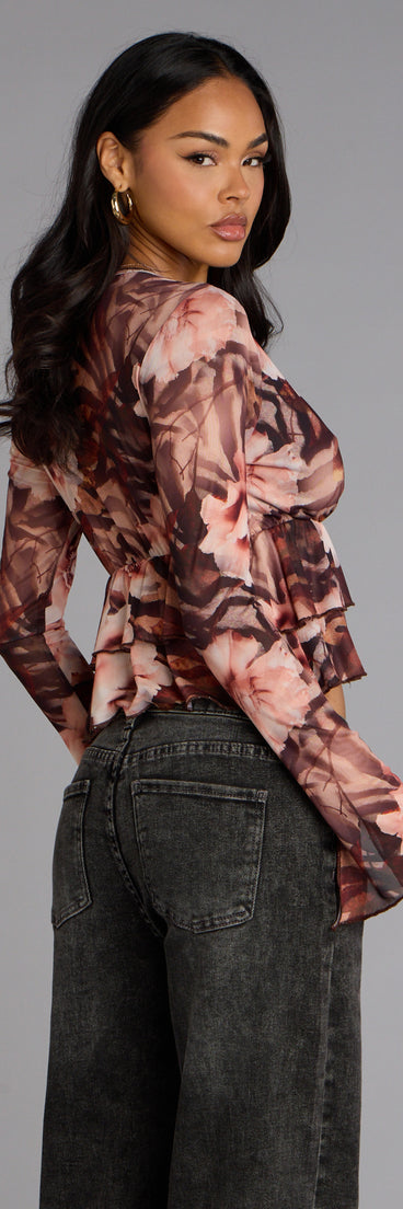 This piece brings trend-right energy to the Falling Petals Floral Crop Top, perfect for fall outfits that stand out.