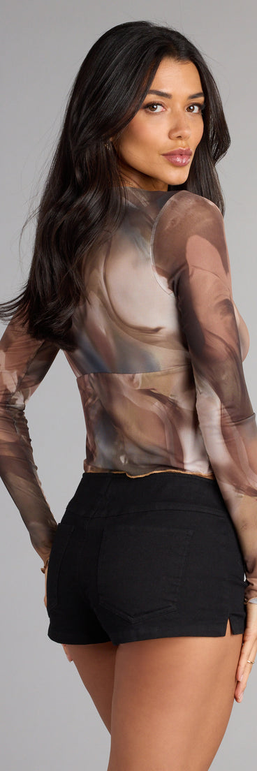 Complete your look with the Sheer Sass Ruffle Tie Front Top, a trendy top that’s ready to pair with anything in your fall rotation.