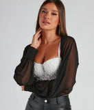 The Sheer Mesh Blouson Sleeve Bolero in black brings edge and energy to your vibe, ready to elevate any festival look or concert outfit.