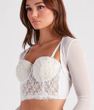 Complete your outfits with the Sheer Mesh Flared Sleeve Bolero, a white fashion jacket that adds stylish edge and versatile appeal.