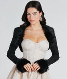 Add the perfect finish with the Exclusive Chic Faux Fur Long Sleeve Bolero, a black bolero that refines your look with effortless charm.