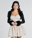 Wrap up in style with the Exclusive Chic Faux Fur Long Sleeve Bolero, a cozy black sweater for women designed for night-out looks, everyday outfits, or as a chic layering piece for cool evenings.
