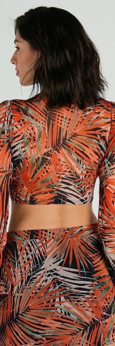 This women's black long-sleeve top combines seasonal color with rich texture, offering a versatile style that's perfect for on-trend winter outfits.