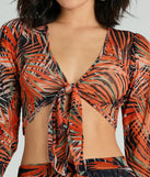 This women's black long-sleeve top combines seasonal color with rich texture, offering a versatile style that's perfect for on-trend winter outfits.