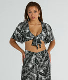 The Time For Vacay Tie Front Tropical Crop Top in black with a modern design and trendy look is part of the latest women's tops collection to elevate your 2025 wardrobe.