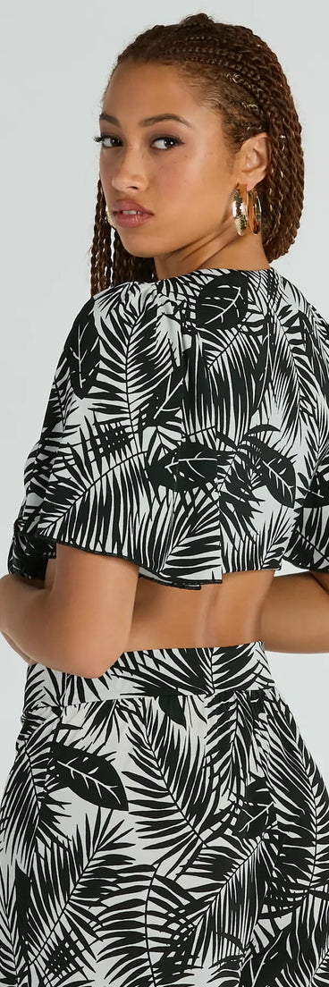 With its midriff cut and trend-forward fit, the Time For Vacay Tie Front Tropical Crop Top is a black crop top made to pair with skirts, denim, or whatever vibe you're feeling this season.