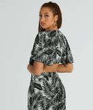 
Upgrade your style game for 2025 with the Time For Vacay Tie Front Tropical Crop Top in black, perfect for any fashion-forward wardrobe.
