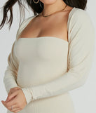 Wrap up in style with the She's The Main Rib Knit Slouchy Bolero, a cozy ivory sweater for women designed for night-out looks, everyday outfits, or as a chic layering piece for the colder months.