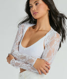 Wrap up in style with the Stylishly Sheer Floral Lace Long Sleeve Bolero, a cozy white sweater for women designed for night-out looks, everyday outfits, or as a chic layering piece for the colder months.