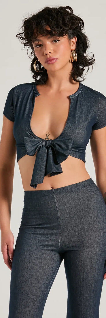 The Cause A Commotion Tie Front Denim Crop Top in denim with a modern design and trendy look is part of the latest women's tops collection to elevate your 2025 wardrobe.