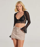 Wrap up in style with the Signature Chic Ruffled Long Sleeve Mesh Bolero, a cozy black sweater for women designed for night-out looks, everyday outfits, or as a chic layering piece for the colder months.
