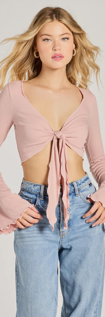 The Infinite Possibilities Long Sleeve Tie-Front Crop Top in pink with a modern design and trendy look is part of the latest women's tops collection to elevate your 2025 wardrobe.