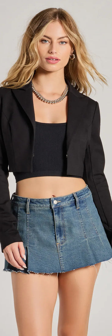 The Posh Moment Ponte Knit Cropped Blazer in black is a women's workwear essential with an elevated fabric and chic silhouette, ideal for layering and versatile enough to take your look from office chic to going-out ready!