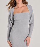 Wrap up in style with the She's The Main Rib Knit Slouchy Bolero, a cozy gray sweater for women designed for night-out looks, everyday outfits, or as a chic layering piece for the colder months.
