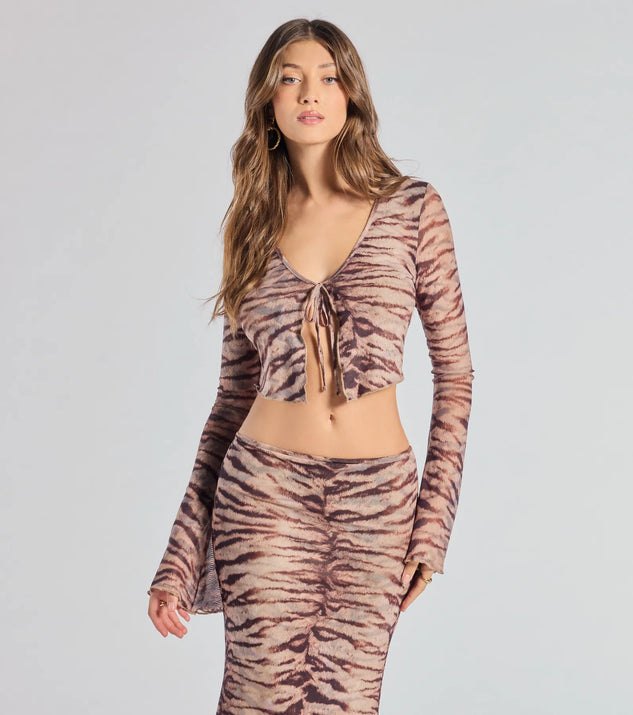 Serve effortless style and scroll-stopping energy in the Strut It Out Abstract Zebra Tie-Front Top, part of a brown matching clothing set that does the work for you with bold, polished vibes from top to bottom.