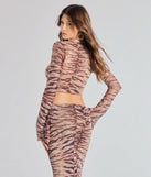 From bold to effortless, the Strut It Out Abstract Zebra Tie-Front Top lets you define your vibe with brown tops that speak your style.