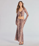 With its midriff cut and trend-forward fit, the Strut It Out Abstract Zebra Tie-Front Top is a brown crop top made to pair with skirts, denim, or whatever vibe you're feeling this season.