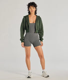 Complete your outfits with the Chill Zone Crop Hoodie With Pockets, a green fashion jacket that adds stylish edge and versatile appeal.