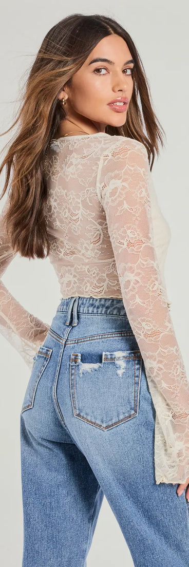 With its midriff cut and trend-forward fit, the Soft And Sweet Tie-Front Split Lace Crop Top is a ivory crop top made to pair with skirts, denim, or whatever vibe you're feeling this season.