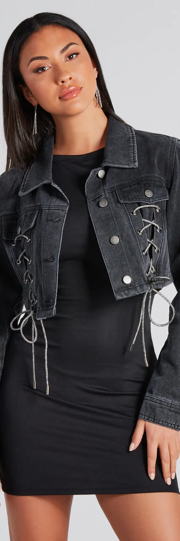 The Outshine In Rhinestone Lace-Up Denim Jacket in black is a women's workwear essential with an elevated fabric and chic silhouette, ideal for layering and versatile enough to take your look from office chic to going-out ready!